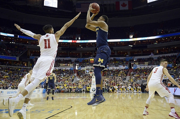 Zak Irvin (21) and Duncan Robinson (22)
