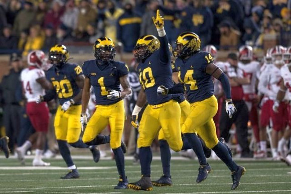 Brad Hawkins (20), Ambry Thomas (1), Devin Bush (10), and Josh Metellus (14)