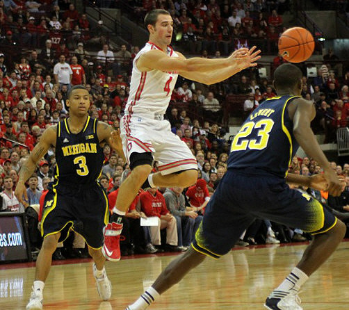 Trey Burke (3) and Caris LeVert (23)