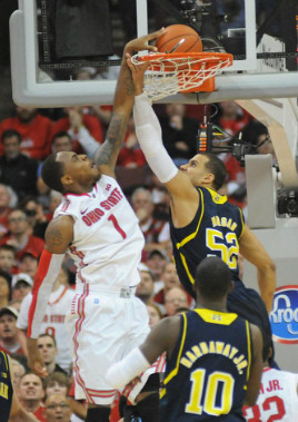 Jordan Morgan (52) and Tim Hardaway Jr. (10)