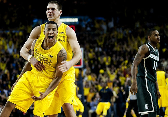 Trey Burke (3) and Mitch McGary (4)