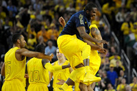 Jon Horford (15), Tim Hardaway Jr. (10), Mitch McGary (4), Corey Person (32), and Trey Burke (3)