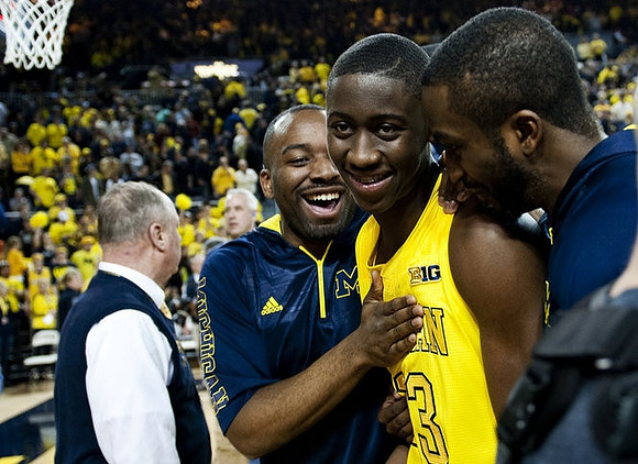 Eso Akunne (5), Caris LeVert (23), and Corey Person (32)