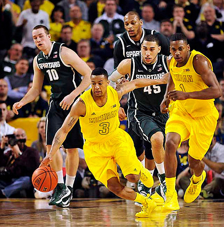 Trey Burke (3) and Glenn Robinson III (1)