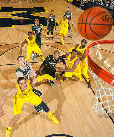 Jordan Morgan (52), Caris LeVert (23), Glenn Robinson III (1), Tim Hardaway Jr. (10), and Trey Burke (3)