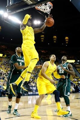 Tim Hardaway Jr. (10) and Jordan Morgan (52)