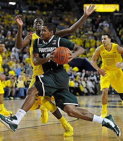 Trey Burke (3), Caris LeVert (23), and Jordan Morgan (52)