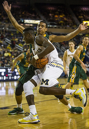 Caris LeVert (23) and Mark Donnal (34)