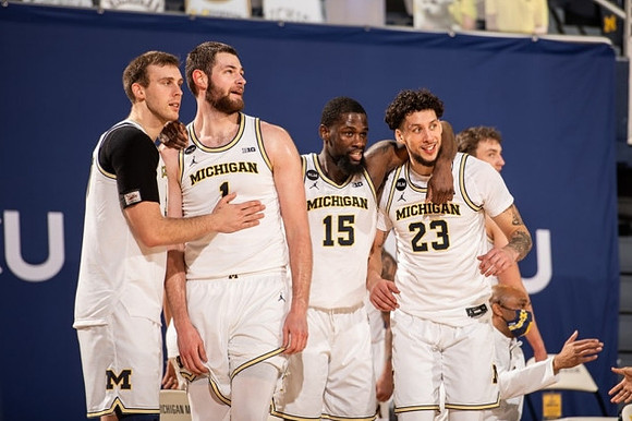 Austin Davis (51), Hunter Dickinson (1), Chaundee Brown Jr. (15), and Brandon Johns Jr. (23)