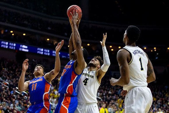 Isaiah Livers (4) and Charles Matthews (1)