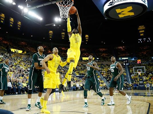 Jordan Morgan (52) and Tim Hardaway Jr. (10)