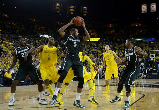 Glenn Robinson III (1), Tim Hardaway Jr. (10), and Mitch McGary (4)