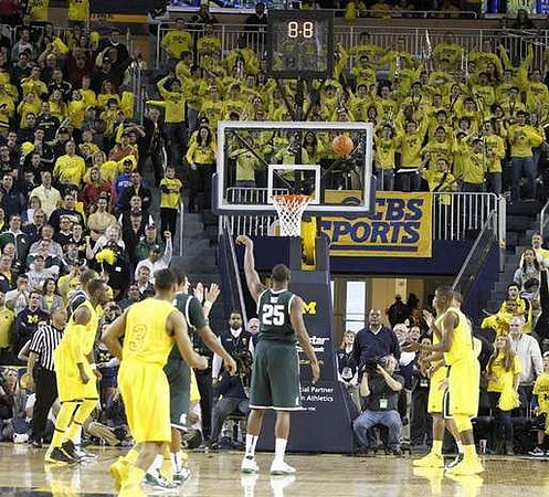 Tim Hardaway Jr. (10), Trey Burke (3), and Caris LeVert (23)