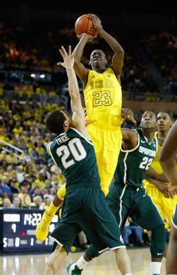 Caris LeVert (23) and Glenn Robinson III (1)