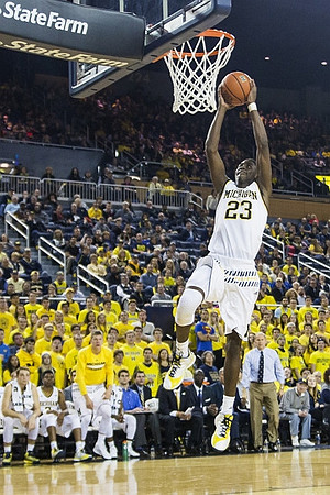 Caris LeVert (23) and John Beilein