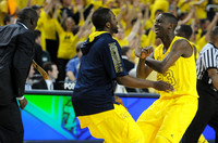 Bacari Alexander, Corey Person (32), and Caris LeVert (23)