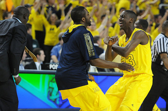 Bacari Alexander, Corey Person (32), and Caris LeVert (23)
