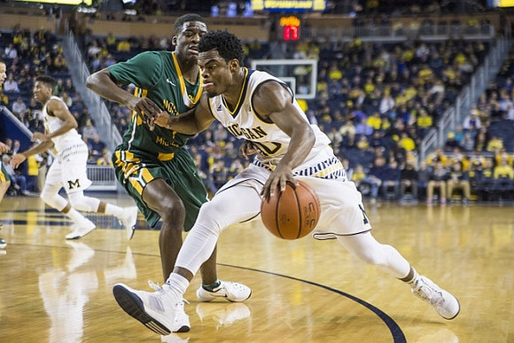 Kameron Chatman (3) and Derrick Walton Jr. (10)