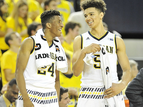 Aubrey Dawkins (24) and D.J. Wilson (5)