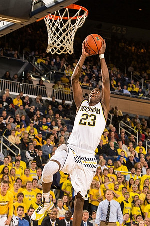 Caris LeVert (23) and John Beilein