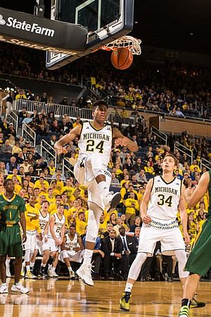 Aubrey Dawkins (24) and Mark Donnal (34)