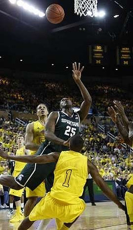 Glenn Robinson III (1), Jordan Morgan (52), and Matt Vogrich (13)