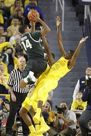 Glenn Robinson III (1) and Caris LeVert (23)
