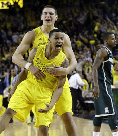 Mitch McGary (4) and Trey Burke (3)
