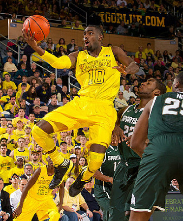 Caris LeVert (23) and Tim Hardaway Jr. (10)