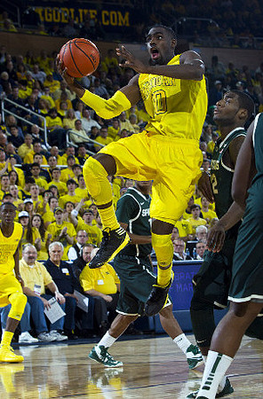 Caris LeVert (23) and Tim Hardaway Jr. (10)