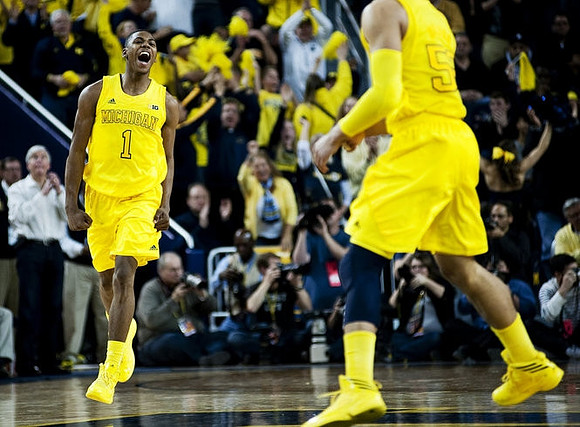 Glenn Robinson III (1) and Jordan Morgan (52)