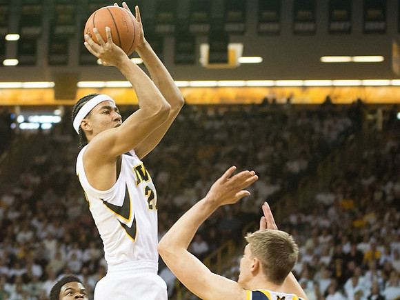 Derrick Walton Jr. (10) and Moritz Wagner (13)