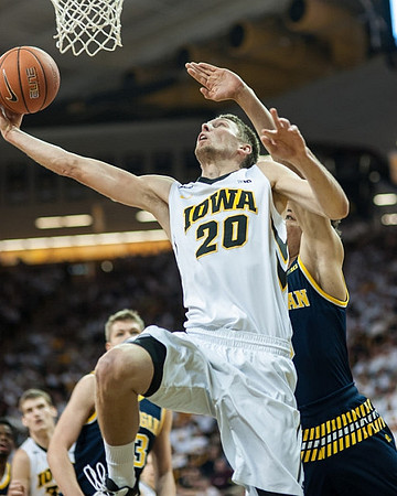 Moritz Wagner (13) and D.J. Wilson (5)