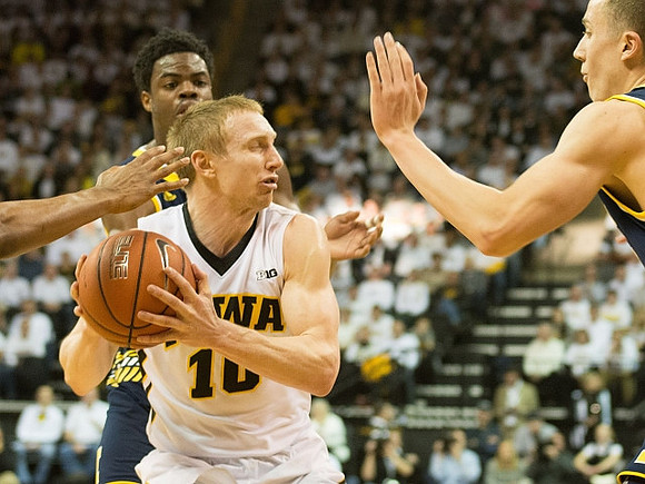 Derrick Walton Jr. (10) and Duncan Robinson (22)