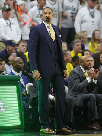 Juwan Howard and Saddi Washington