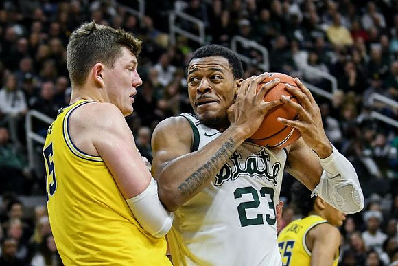 Jon Teske (15) and Eli Brooks (55)
