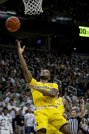 Zavier Simpson (3) and Eli Brooks (55)