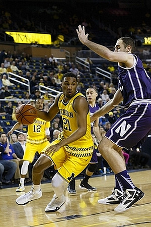 Muhammad-Ali Abdur-Rahkman (12) and Zak Irvin (21)