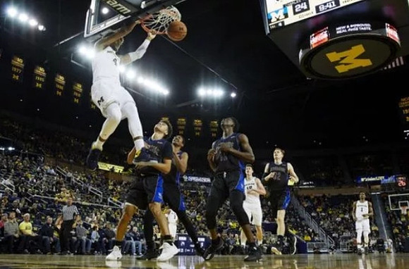 Isaiah Livers (4), Zavier Simpson (3), Moritz Wagner (13), and Charles Matthews (1)