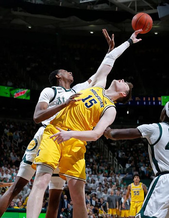 Jon Teske (15) and Eli Brooks (55)