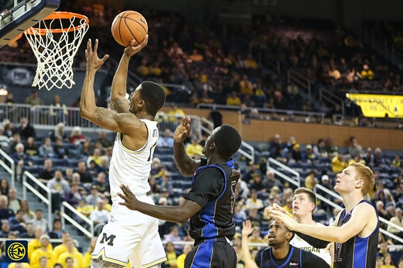 Charles Matthews (1) and Jon Teske (15)