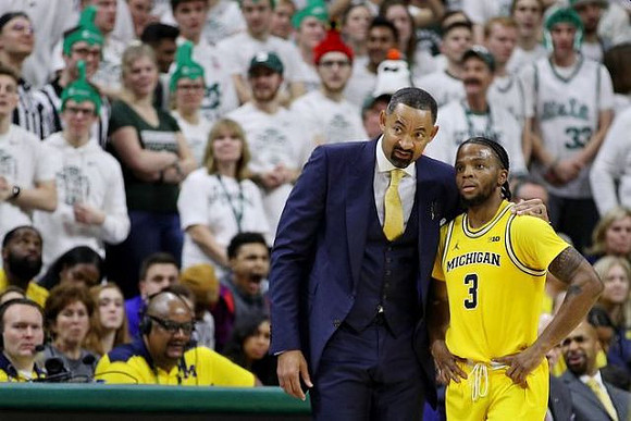 Juwan Howard and Zavier Simpson (3)