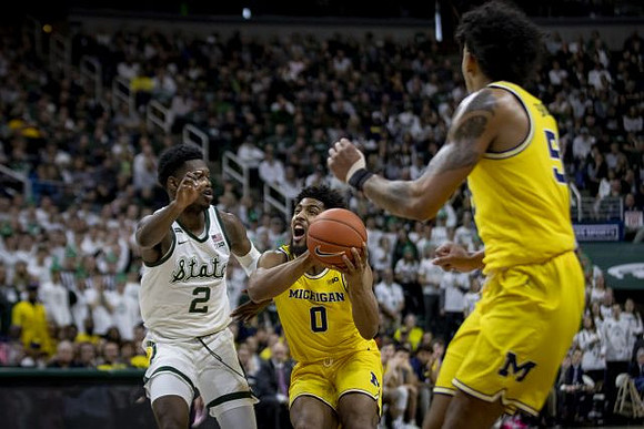 David DeJulius (0) and Eli Brooks (55)