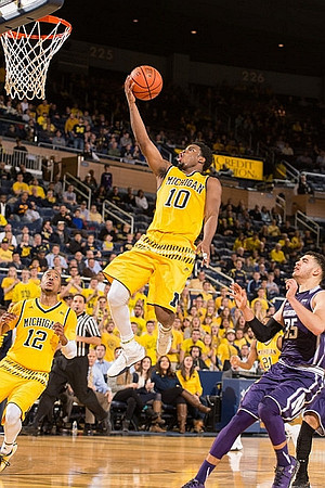 Muhammad-Ali Abdur-Rahkman (12) and Derrick Walton Jr. (10)
