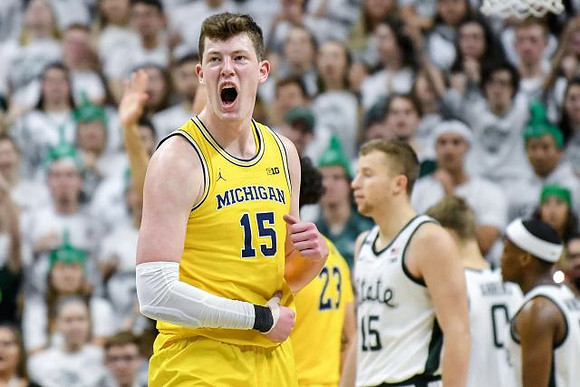 Jon Teske (15) and Brandon Johns Jr. (23)