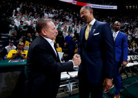 Michigan State Head Coach Tom Izzo and Juwan Howard