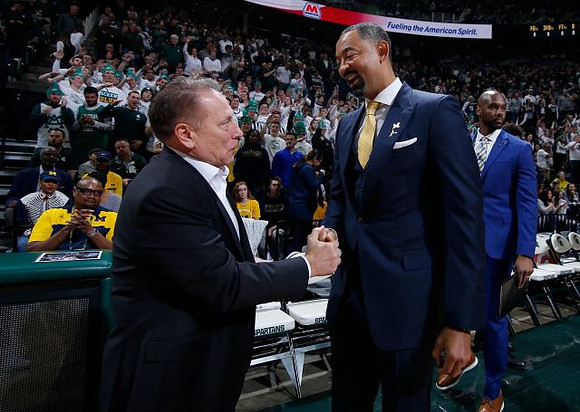 Michigan State Head Coach Tom Izzo and Juwan Howard