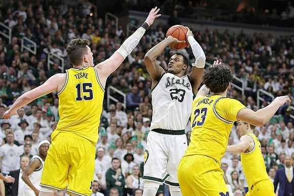 Jon Teske (15), Brandon Johns Jr. (23), and Franz Wagner (21)