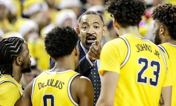Zavier Simpson (3), David DeJulius (0), Juwan Howard, Brandon Johns Jr. (23), and Isaiah Livers (2)