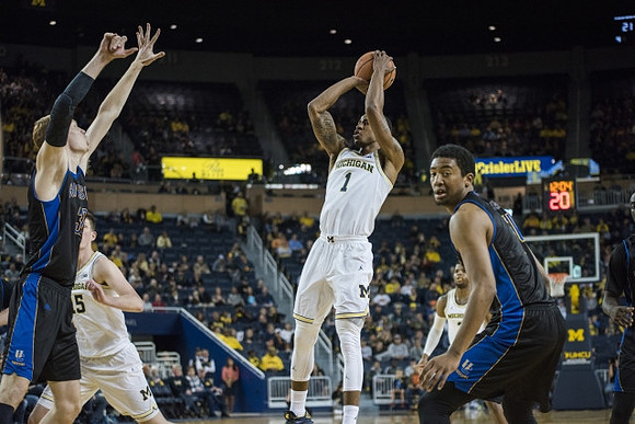 Jon Teske (15) and Charles Matthews (1)